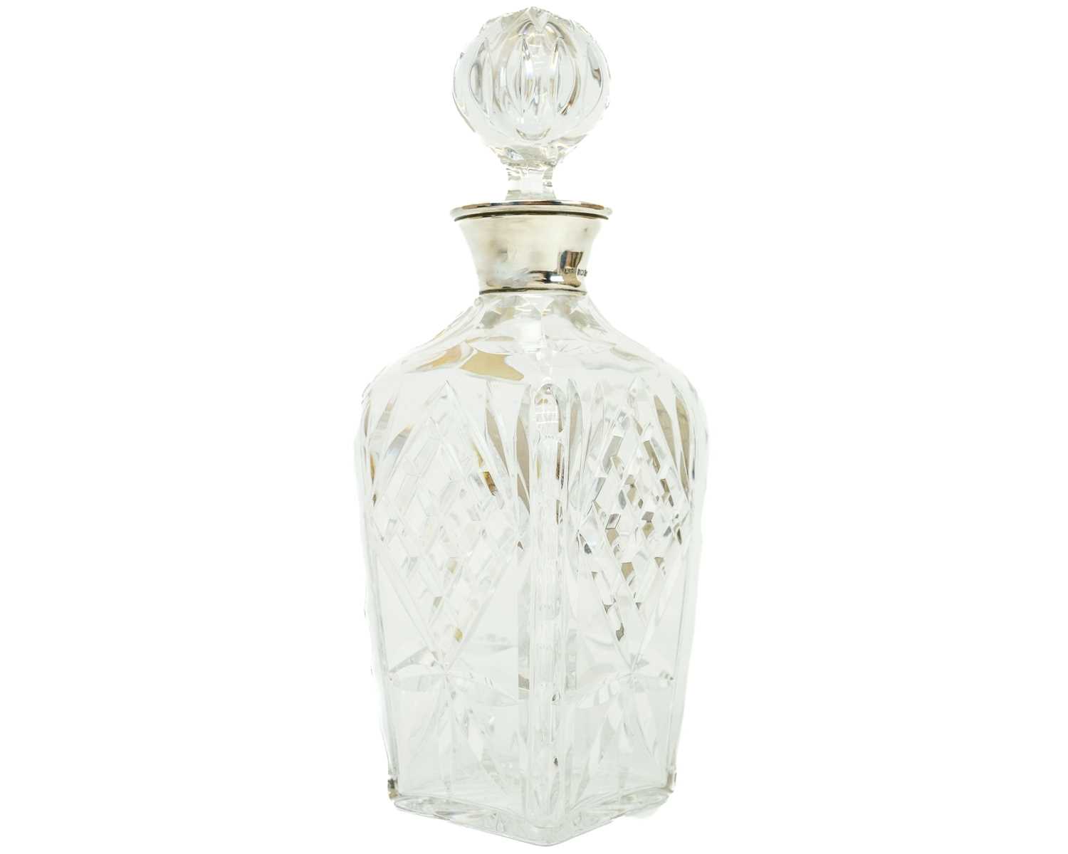 Lot 397 - A Bavarian lead crystal decanter and stopper with silver collar.