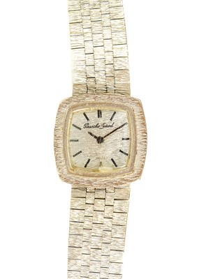 Lot 196 - BUECHE-GIROD - A 9ct white gold lady's quartz bracelet wristwatch.