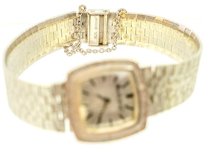 Lot 196 - BUECHE-GIROD - A 9ct white gold lady's quartz bracelet wristwatch.