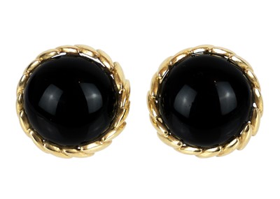 Lot 262 - A 14ct mounted pair of cabochon black onyx set round stud and clip earrings.