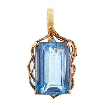 Lot 261 - A 14ct blue topaz and diamond set pendant.