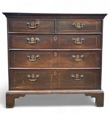 Lot 254 - An 18th century oak chest of drawers.