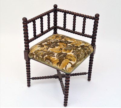 Lot 3472 - An Arts and Crafts bobbin turned corner chair,...