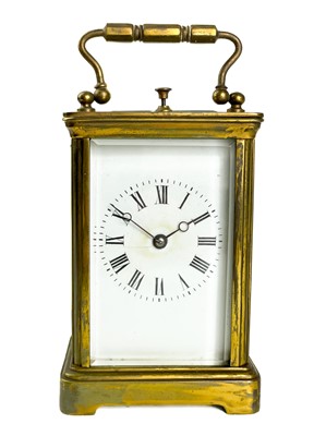 Lot 548 - A French brass repeating carriage clock.