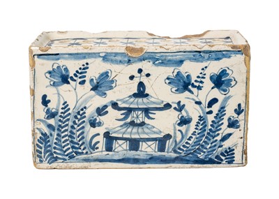 Lot 1085 - A Delft blue and white flower brick.