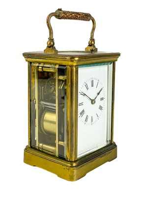 Lot 550 - A French brass repeating carriage clock.