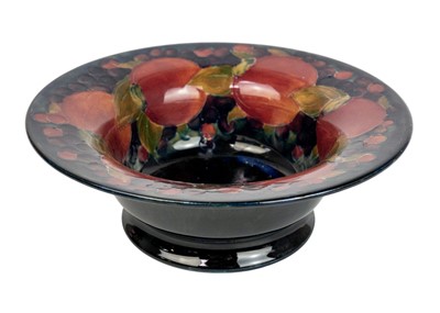 Lot 427 - A Moorcroft pomegranate pattern flared rim bowl.