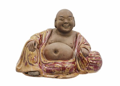 Lot 352 - A Chinese pottery model of Buddha, 18th/19th century.