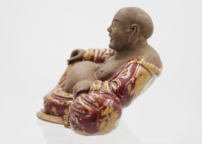 Lot 352 - A Chinese pottery model of Buddha, 18th/19th century.