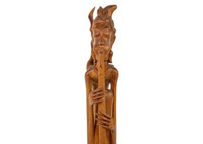 Lot 376 - A large Balinese carved wood figure, 20th century