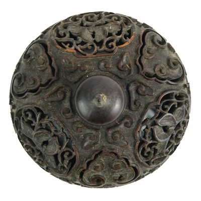 Lot 378 - A Chinese carved wood vase cover, late 19th/early 20th century.