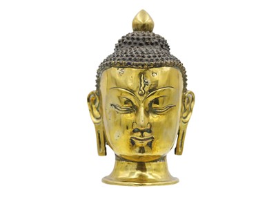 Lot 381 - A Sino-Tibetan gilt bronze head of a Buddha, 19th century.