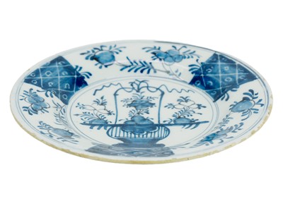 Lot 1150 - A collection of three various Delft blue and white plates