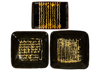 Lot 1269 - Three slipware pottery dishes.