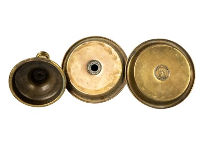 Lot 1099 - A 19th century brass candlestick VR below a crown.