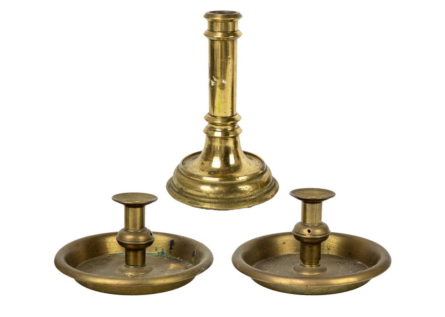Lot 1099 - A 19th century brass candlestick VR below a crown.