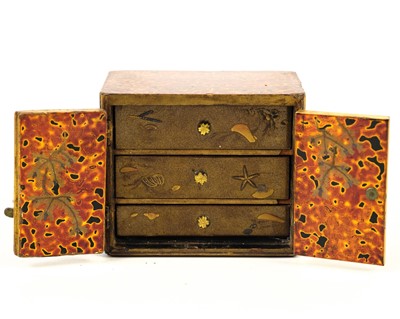 Lot 382 - A Japanese miniature lacquer cabinet, Meiji period.