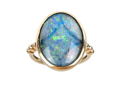 Lot 271 - A 9ct black triplet opal ring.