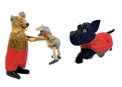 Lot 330 - A Schuco clockwork tinplate tumbling mouse and a Scottie dog.