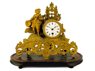 Lot 551 - A French gilt metal figural mantel clock.