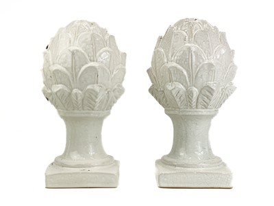 Lot 365 - A pair of ceramic artichokes with crackle glaze finish.