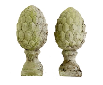 Lot 535 - A pair of reconstituted stone artichoke finials.