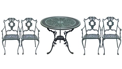 Lot 522 - A green painted metal bistro set.