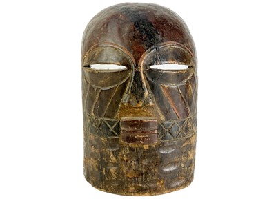 Lot 268 - An African mask.