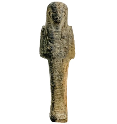 Lot 281 - An Egyptian dark faience Ushabti figure.