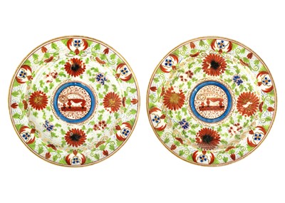 Lot 370 - Two early 19th century Minton plates painted with the 'Crazy Cow' pattern.