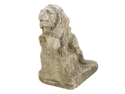 Lot 523 - A 19th  century carved stone sculpture of a lion climbing uphill.