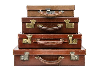 Lot 231 - Four small brown leather suitcases/briefcases.