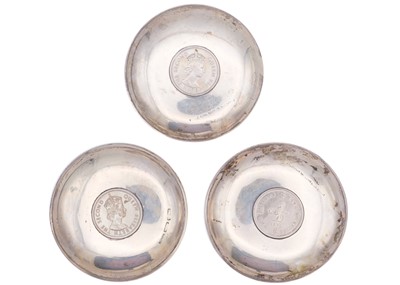Lot 27 - Three modern Chinese sterling silver pin dishes.