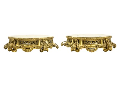 Lot 129 - A pair of neo-classical French ormolu, shaped base mounts.