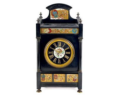 Lot 549 - A Victorian Aesthetic movement slate mantel clock.
