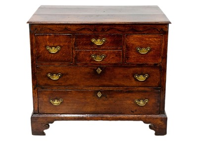 Lot 1284 - A 18th century oak chest of drawers.