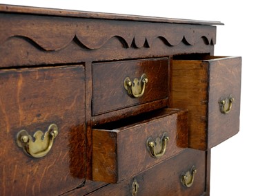 Lot 1284 - A 18th century oak chest of drawers.