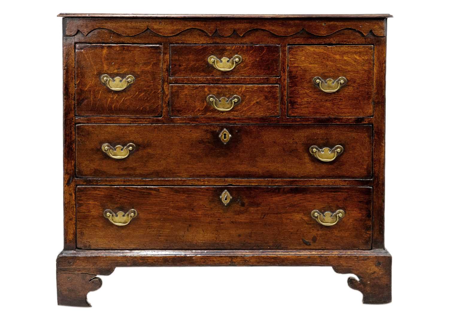 Lot 1284 - A 18th century oak chest of drawers.