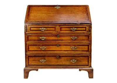 Lot 1169 - A George III oak and fruitwood crossbanded bureau.