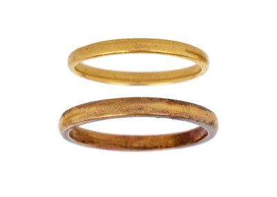 Lot 55 - Two 22ct gold band rings.