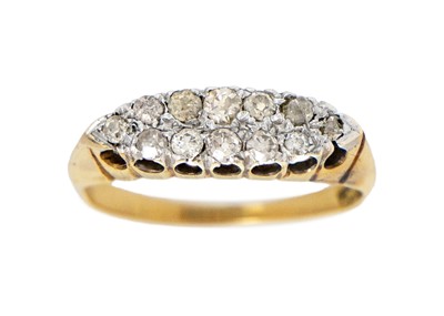 Lot 275 - An 18ct diamond set boat-shaped ring.