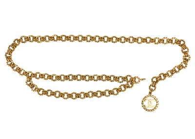 Lot 391 - A Chanel 24ct gold-plated chain belt, circa 1986.