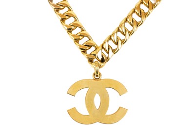Lot 386 - A Chanel 24ct gold-plated chunky curb-link and CC medallion belt, circa 1993.