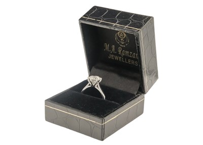 Lot 9 - An impressive 1.97ct diamond set solitaire ring set in platinum.