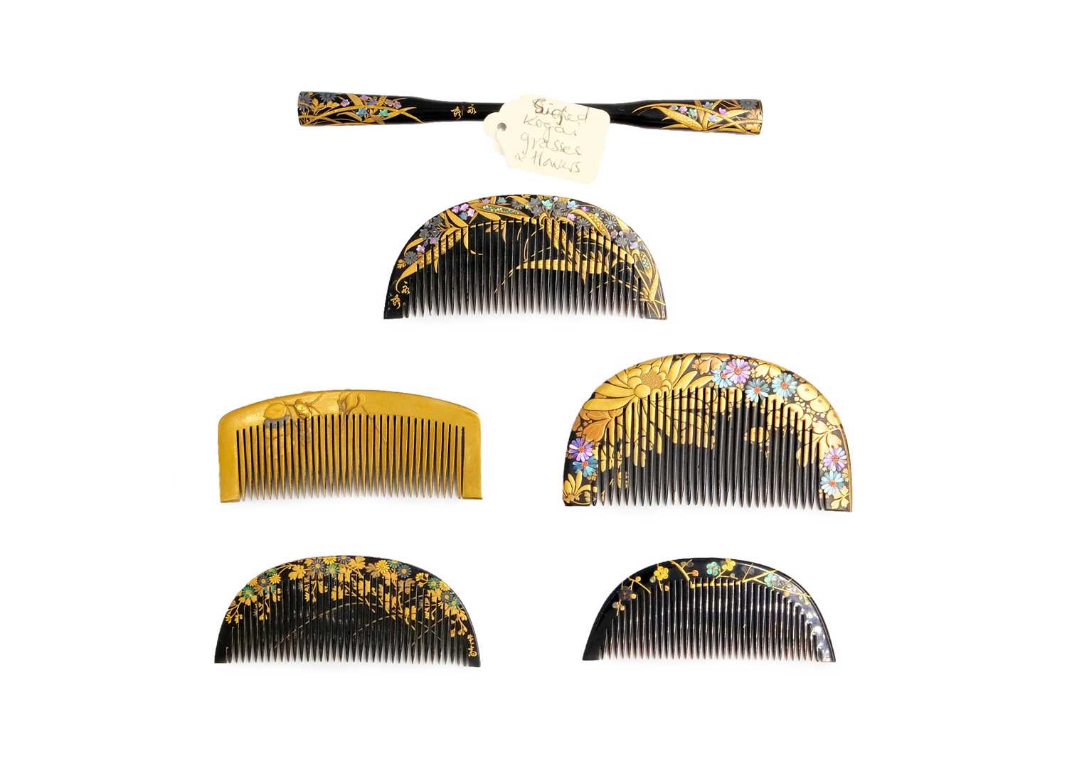 Lot 405 - A Japanese gilded comb, Edo period.