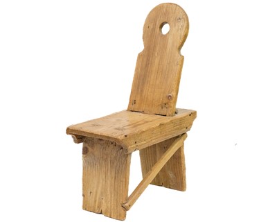 Lot 588 - A rustic folk art pine spinning chair or stool.