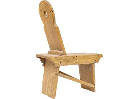 Lot 588 - A rustic folk art pine spinning chair or stool.