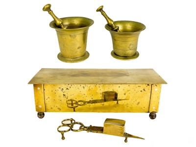 Lot 164 - A 19th century brass pestle and mortar.