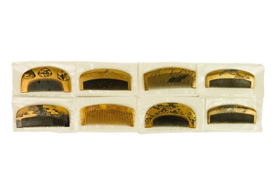 Lot 1022 - Eight Japanese gold lacquer combs, Meiji period.