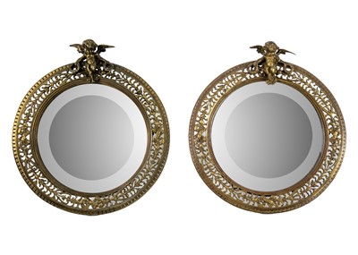 Lot 69 - A pair of late 19th century circular brass frame table mirrors.